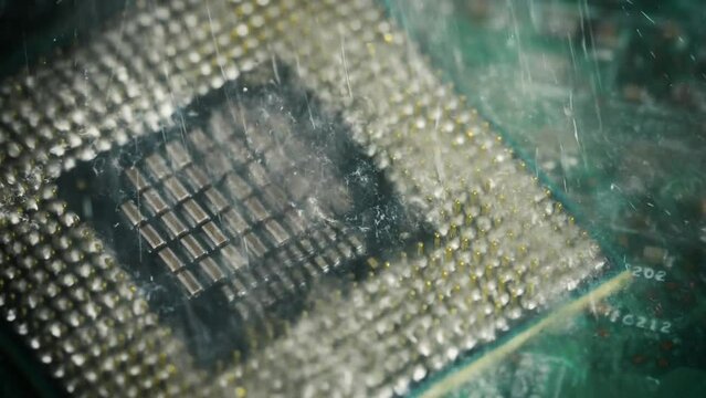Technology cyber electronic concept. Cpu processor computer under the water. CPU cooling with water. Processor under water. Damaged electronics