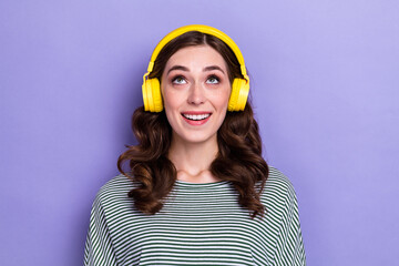 Photo of positive pretty lady wear trendy clothes interested look empty space cool offer proposition isolated on purple color background