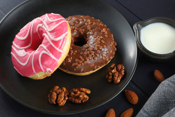 Donuts on a plate. Tasty and sweet breakfast.