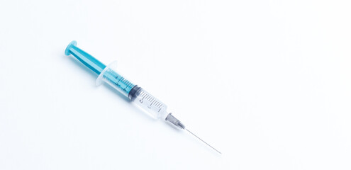 Fototapeta premium Disposable plastic syringe prepared for injection and vaccination in the hospital. The concept of medicine and health