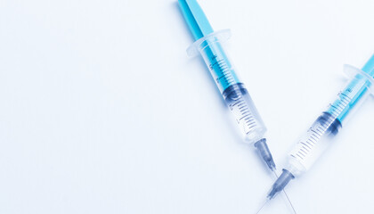 Disposable plastic syringe prepared for injection and vaccination in the hospital. The concept of medicine and health