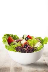 Tasty healthy food with salad on the desk