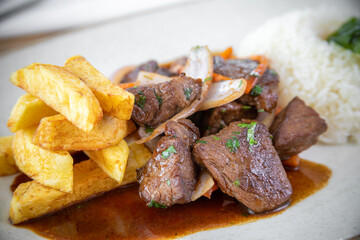 Typical peruvian food and drinks, tenderloin sautéed
