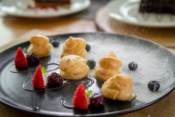 Typical peruvian food and drinks, profitelores with fruit