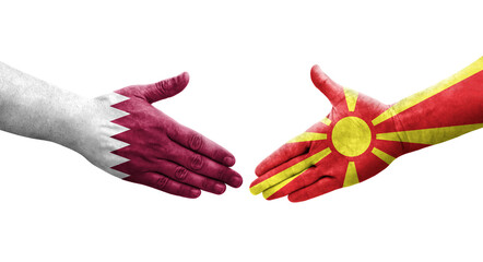 Handshake between North Macedonia and Qatar flags painted on hands, isolated transparent image.