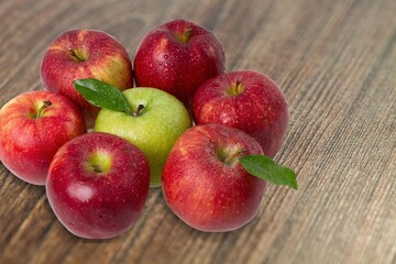 Fresh ripe juicy apple fruits on the desk