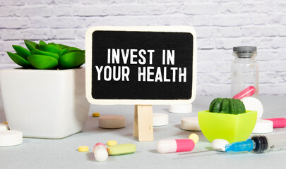 Blackboard with the text Invest in your health