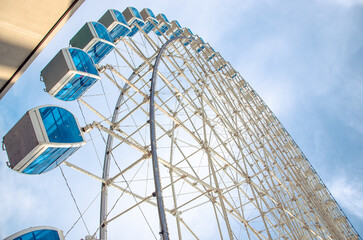 ferris wheel on a blue sky