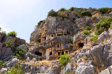Fototapeta na wymiar Lycian rock-cut tombs carved into vertical cliffs at Myra, modern Demre, Antalya province, Turkey.