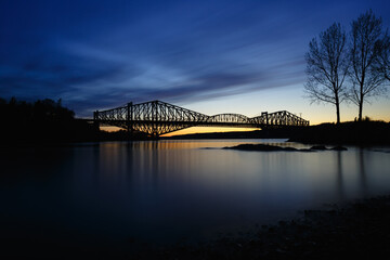Quebec bridge at sunset, long exposure, from the Saint-Romuald Marina, L&eacute;vis, Quebec, Canada