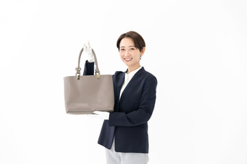 女性・鑑定・バッグ・白バック