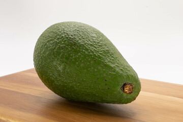 avocado on wooden table