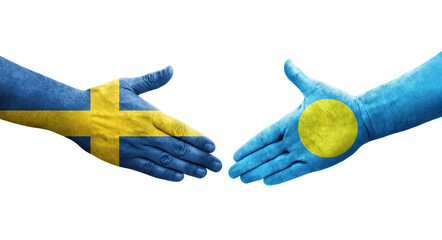 Handshake between Palau and Sweden flags painted on hands, isolated transparent image.