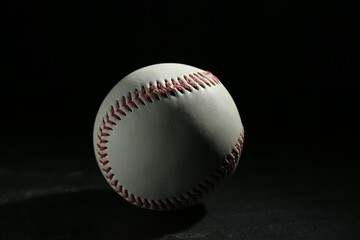 Baseball ball on black background. Sports game
