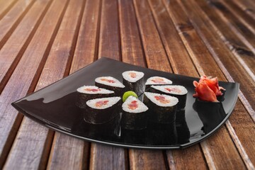 Fresh tasty Sushi Rolls dish on the desk