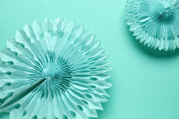 Paper flowers on mint background