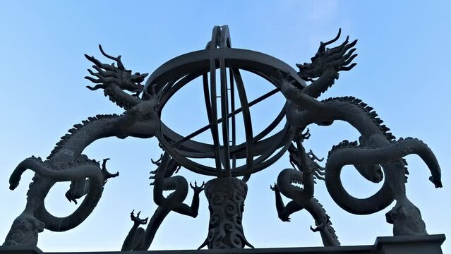 Rotating shot of the sculpture of the seismograph invented by Zhang Heng of the Eastern Han Dynasty
