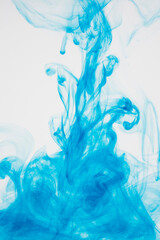 Fototapeta premium blue ink dissolving in water