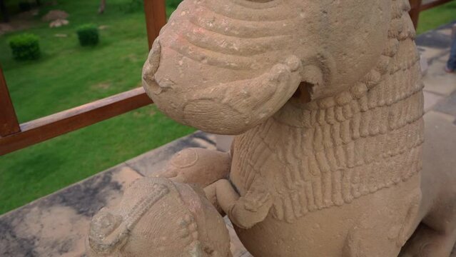 Stone Sculptures Of A Lion And Woman At Khajuraho Temple In Madhya Pradesh, India. - Closeup
