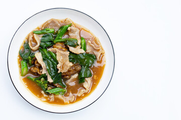 Fried flat noodle with pork and kale in gravy sauce