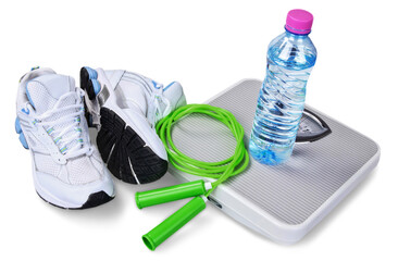 Sport Shoes, stopwatch and water bottle and skipping rope isolated on white