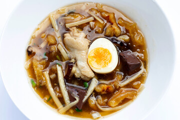 Fish maw soup on white background.