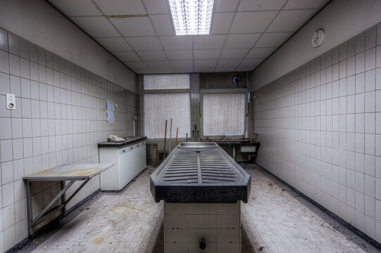 Autopsy antique tables in the morgue in clinic from the big city.