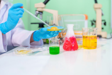 Modern Medical Research Laboratory: Stem cell researcher working in laboratory Study on Stem Cells on the Stereo microscope view in laboratory , Advanced Scientific Lab for Medicine, Biotechnology.