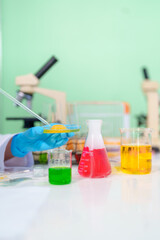 Modern Medical Research Laboratory: Stem cell researcher working in laboratory Study on Stem Cells on the Stereo microscope view in laboratory , Advanced Scientific Lab for Medicine, Biotechnology.
