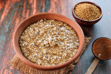 Fenugreek seeds porridge gruel soup or Uluva Kanji   navara kichadi. Monsoon Post Delivery Care Diet for lactating mothers. Health drink Kerala India. marunnu kanji Ayurveda porridge  kanji