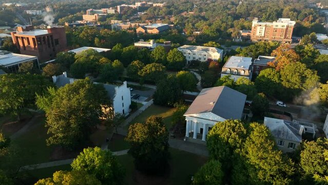 University of Georgia. College campus aerial during magic hour light. Establishing shot of UGA, home of Bulldogs.