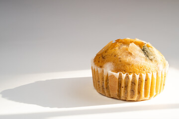 The cupcakes is spoiled and moldy. Waste food concept