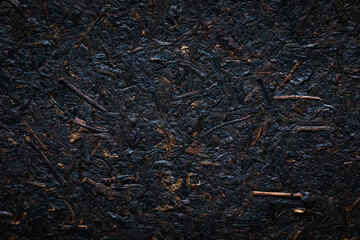 Squeeze black tea texture. Squeeze black tea close-up.