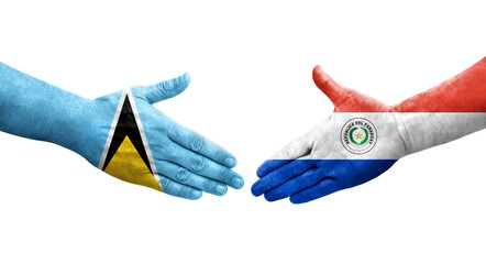 Handshake between Paraguay and Saint Lucia flags painted on hands, isolated transparent image.