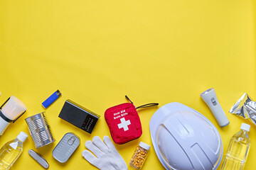 Disaster preparedness kit on yellow background.	 - obrazy, fototapety, plakaty