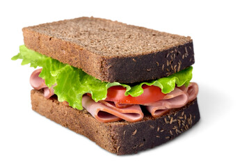 Sandwiches with meet, vegetables and mustard on crusty fresh sliced rye bread