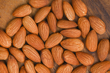 Almonds nuts on background, Close up delicious sweet almonds, roasted almond nut for healthy food and snack