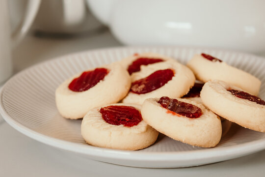 Jam drop biscuits on a plate.