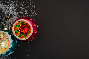 card, flyer, christmas black background with christmas balls and toys