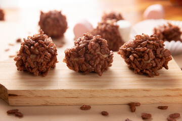 Homemade Caramel Marshmallows covered in chocolate flavor puffed rice, sweet treat easy to make, no baking required, ideal for parties and festivities