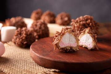 Homemade Caramel Marshmallows covered in chocolate flavor puffed rice, sweet treat easy to make, no baking required, ideal for parties and festivities, Christmas favorites.