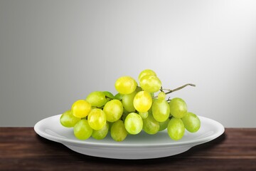 Tasty sweet aroma ripe grapes on a plate
