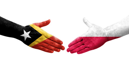 Handshake between Poland and Timor Leste flags painted on hands, isolated transparent image.