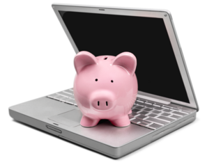 Piggy Bank on Laptop Keyboard
