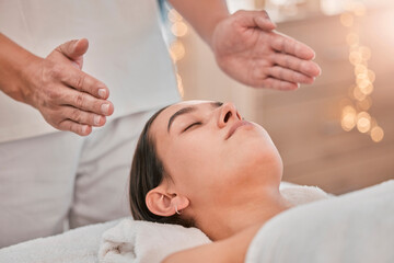 Obraz na płótnie Canvas Spa, massage and reiki with head of woman for energy, chakra and spiritual therapy. Health, wellness and holistic healing with hands of therapist in salon for luxury, relax and alternative medicine