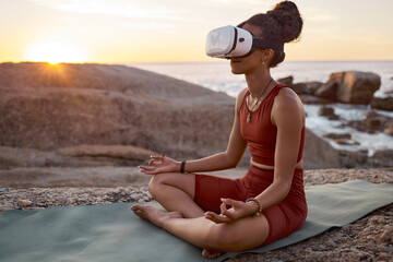 Woman, metaverse or vr headset in yoga meditation by beach, ocean waves, sea water in mental health support, zen app or 3d peace ai. Lotus, relax or wellness person on virtual reality chakra software