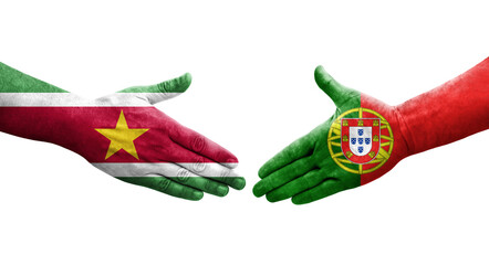 Handshake between Portugal and Suriname flags painted on hands, isolated transparent image.