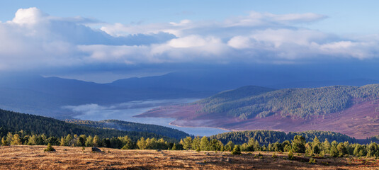 Mountain valley with lake, autumn view, cloudy morning, panorama