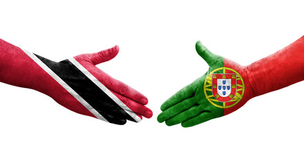 Handshake between Portugal and Trinidad Tobago flags painted on hands, isolated transparent image.