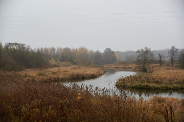 Naklejka na ściany i meble autumn landscape with river
